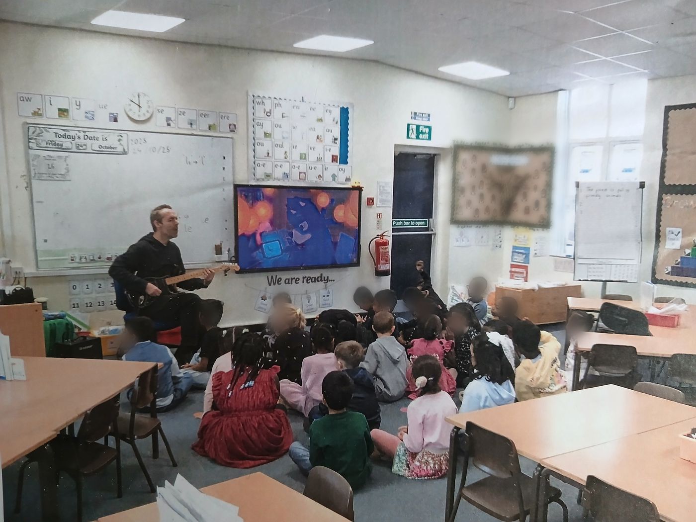 Andrew Scholfield teaching a whole-class guitar lesson